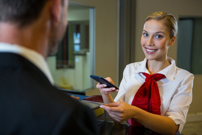 female scanning passport